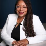 Hon. Adrienne Scruggs - Director