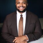 Brandon Wilson, Esq. - Director